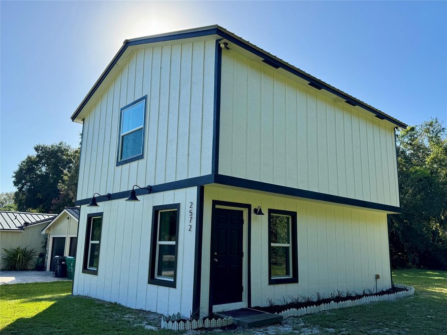 Built in 2020, this charming 2-bedroom, 1.5-bath home is located on a great cut de sac  in the southwest section, the property is surrounded by beautiful grandfather oaks.  Inside, you’ll find luxury vinyl plank flooring throughout, new appliances, and a bright, open feel. The home features a durable metal roof, hurricane impact windows, and a tankless hot water heater for energy efficiency. There is an RV hookup and pad for convenient storage. With its combination of quality construction, thoughtful upgrades, and a desirable location, this home is move-in ready and perfect for comfortable living.