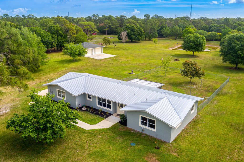 Photo of 4051 SW Citrus Boulevard, Palm City, FL 34990 (MLS # R10783859)