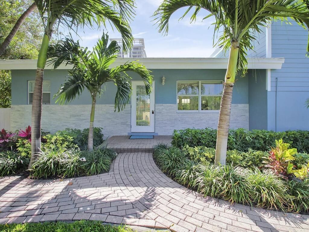 Photo of 1310 Manor Drive, Singer Island, FL 33404 (MLS # B26022970)