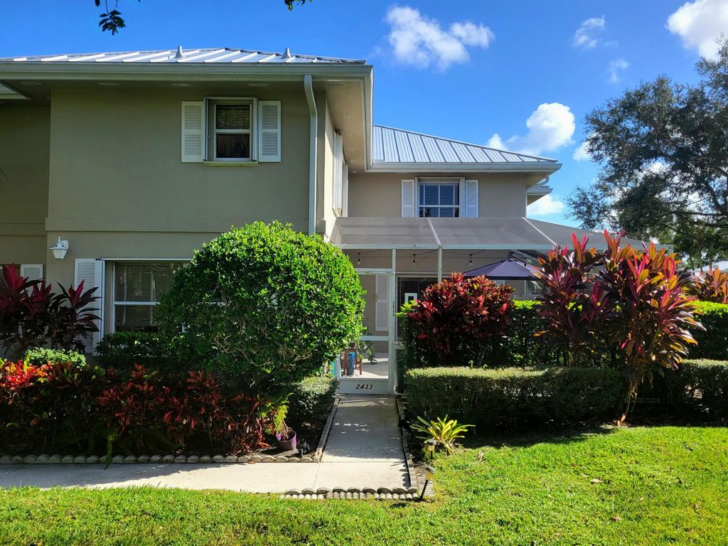 Photo of 2433 SW Danbury Lane, Palm City, FL 34990 (MLS # R10930367)