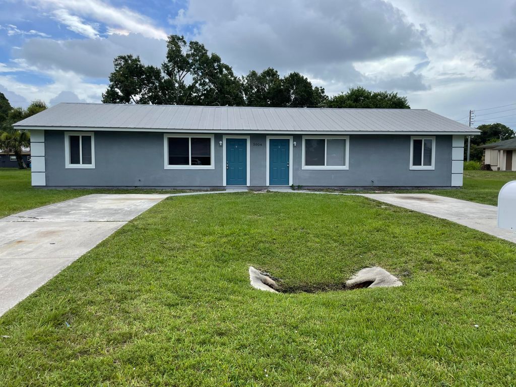 Photo of 5004 Killarney Avenue Ave #A, Fort Pierce, FL 34951 (MLS # R10814546)