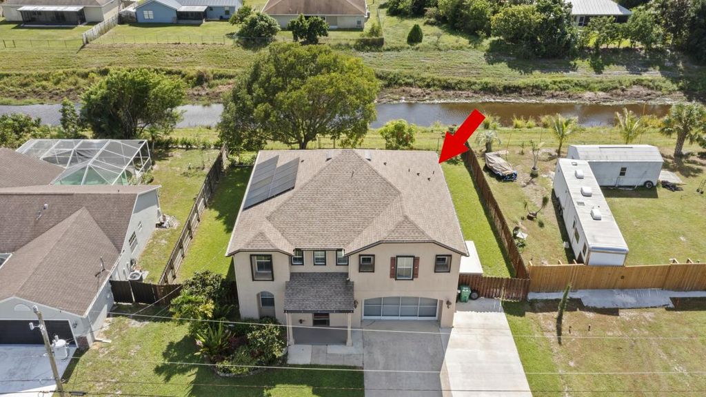 Photo of 864 SW Java Avenue, Port Saint Lucie, FL 34953 (MLS # R11125645)