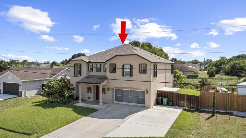 Photo of 864 SW Java Avenue, Port Saint Lucie, FL 34953 (MLS # R11125645)