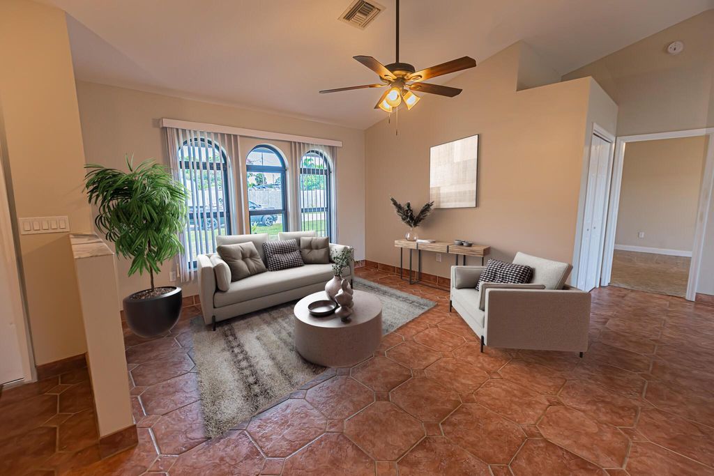 Photo of 2213 SE Rock Springs Drive, Port Saint Lucie, FL 34952 (MLS # R11117768)