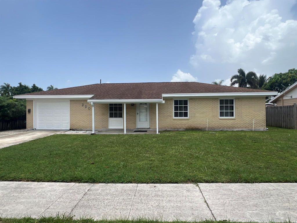 Photo of 220 Davis Road, Palm Springs, FL 33461 (MLS # R11006412)