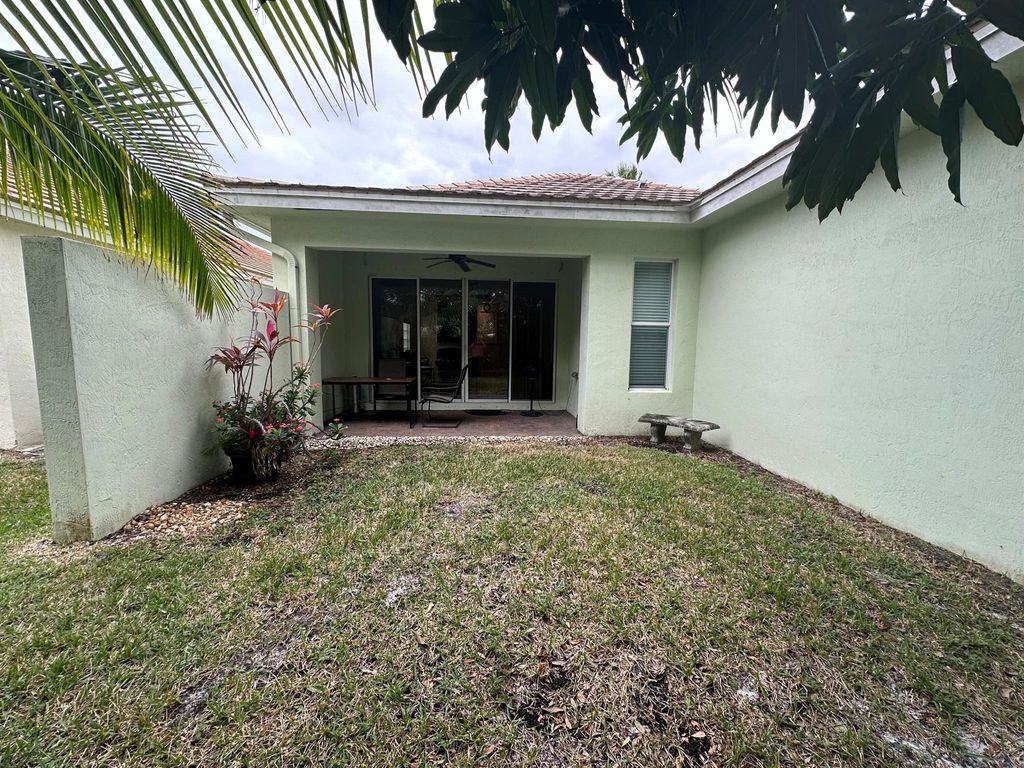 Photo of 73 Mulberry Grove Road, Royal Palm Beach, FL 33411 (MLS # R11101701)