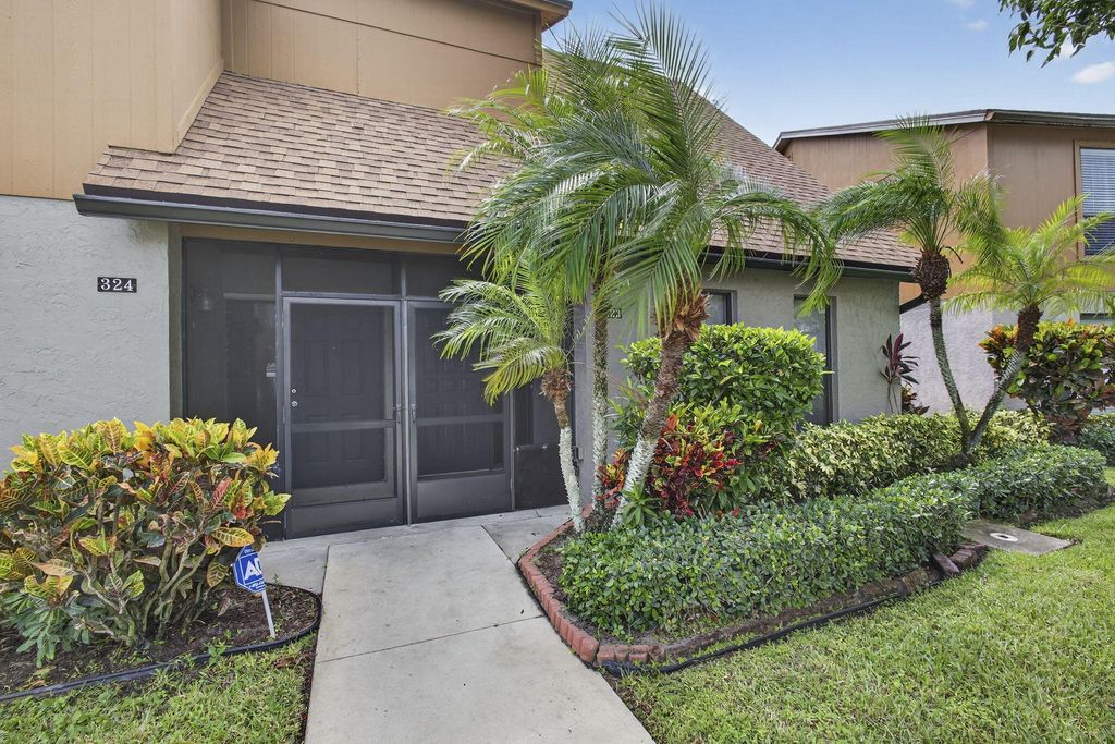 Photo of 323 Sandtree Drive, Palm Beach Gardens, FL 33403 (MLS # R11129153)