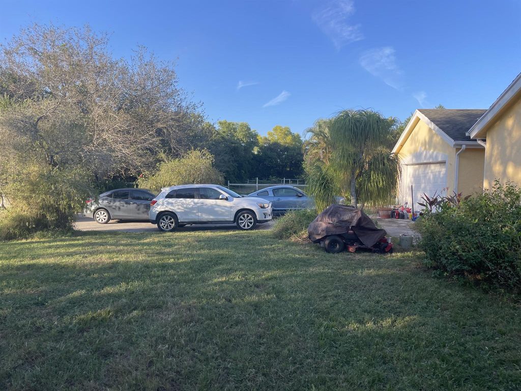 Photo of 16620 79th Terrace N, Palm Beach Gardens, FL 33418 (MLS # R10924827)