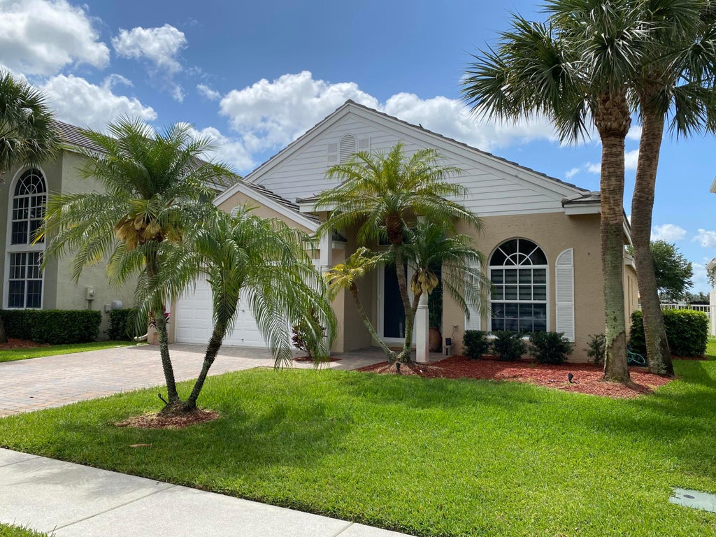 Photo of 325 Berenger Walk, Royal Palm Beach, FL 33414 (MLS # B26086196)