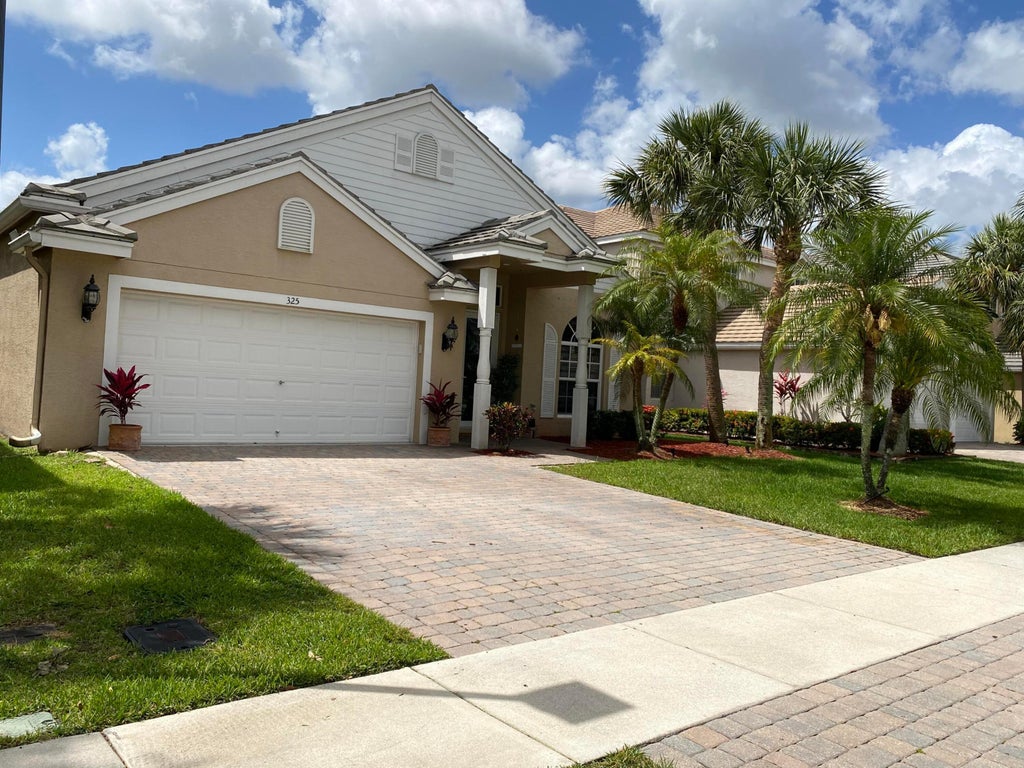 Photo of 325 Berenger Walk, Royal Palm Beach, FL 33414 (MLS # B26086196)