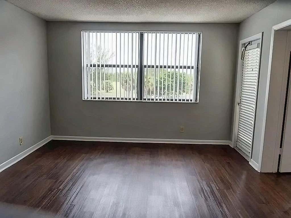 Photo of 708 EXECUTIVE CENTER Drive #12, West Palm Beach, FL 33401 (MLS # B26059702)