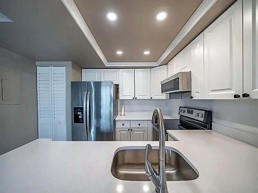 Photo of 708 EXECUTIVE CENTER Drive #12, West Palm Beach, FL 33401 (MLS # B26059702)