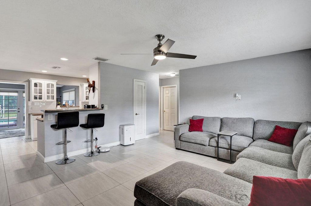 Photo of 2359 Holly Lane, Palm Beach Gardens, FL 33410 (MLS # B26088072)
