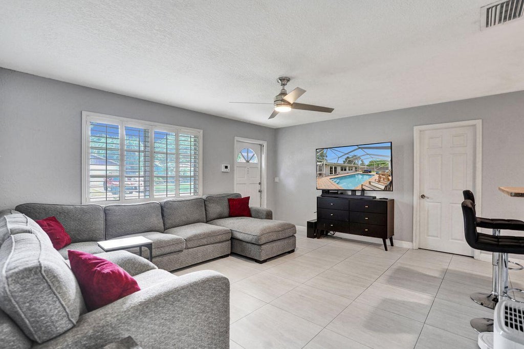 Photo of 2359 Holly Lane, Palm Beach Gardens, FL 33410 (MLS # B26088072)