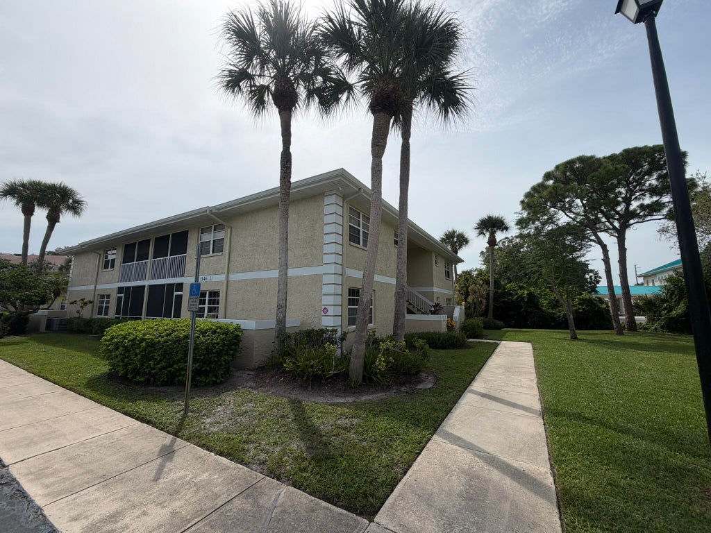 Photo of 1546 SE ROYAL GREEN Circle #102, Port Saint Lucie, FL 34952 (MLS # B26053871)