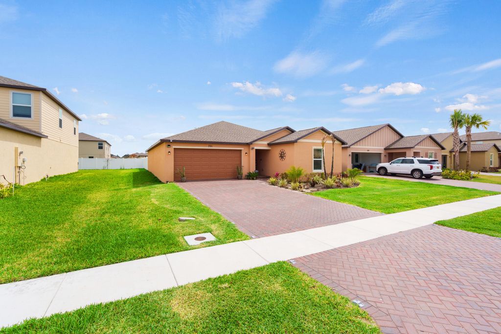 Photo of 701 Carlyle Way, Fort Pierce, FL 34947 (MLS # B26005266)