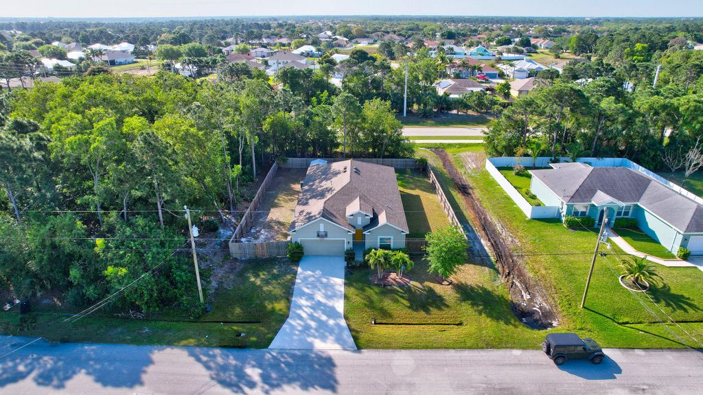 Photo of 6163 NW Deville Circle, Port Saint Lucie, FL 34953 (MLS # R11091771)