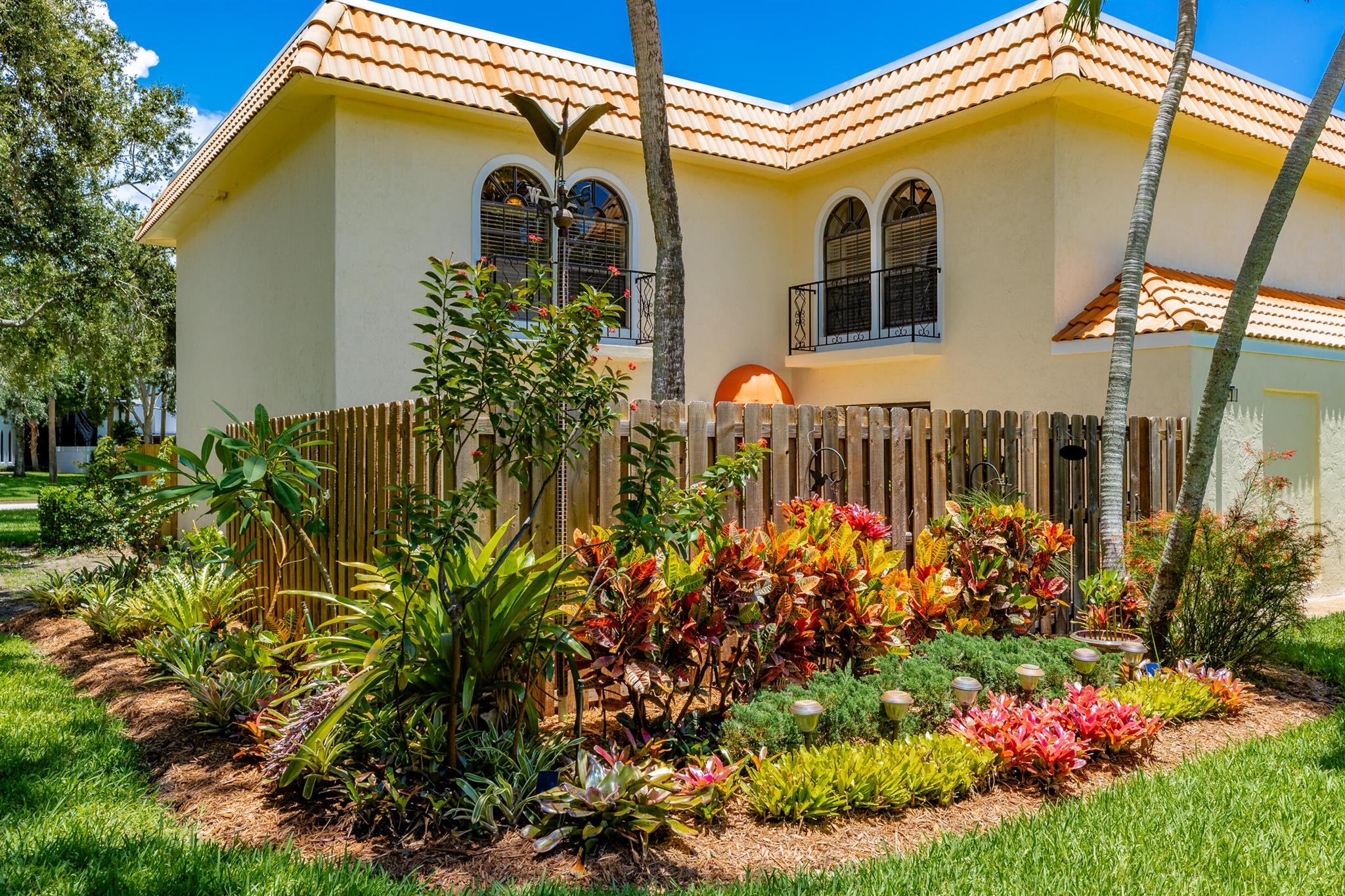 Searching for an affordable property within walking distance to downtown, you've JUST found a RARE OPPORTUNITY. Welcome to southern palms, conveniently located 0.7 miles from downtown and 3 miles from the beach. With only 8 units in total. This townhouse is a 2/1.5 featuring 2 parking spaces. Recently completed brick paver patio and thoughtfully landscaped. 2019 A/C, 2024 HWH& 2024 roof. Kitchen remodeled with stone countertops and SS appliances. 1/2 bath with laundry located on the 1st floor. Upstairs we have two spacious bedrooms with a shared bathroom. Both bathrooms have updated vanities an VERY RARE&@