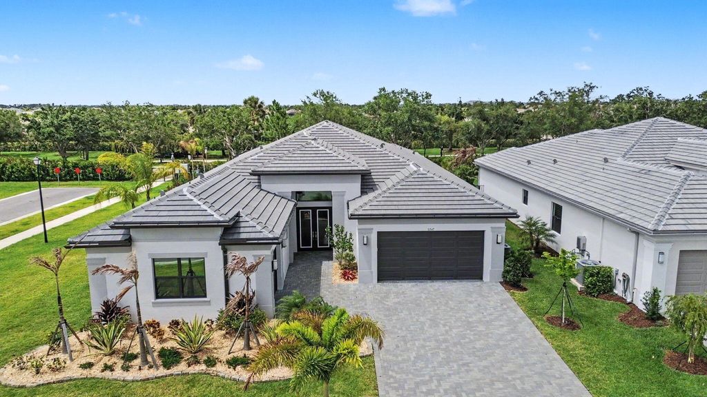 Photo of 11347 SW Sea Cove Lane, Port Saint Lucie, FL 34987 (MLS # B26025986)