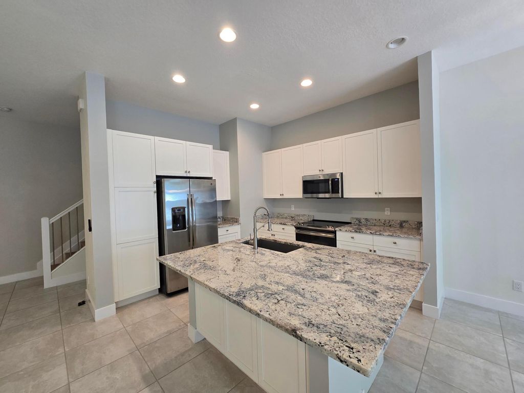 Photo of 4920 Pointe Midtown Way, Palm Beach Gardens, FL 33418 (MLS # B26022460)