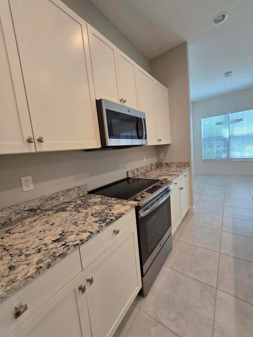 Photo of 4920 Pointe Midtown Way, Palm Beach Gardens, FL 33418 (MLS # B26022460)