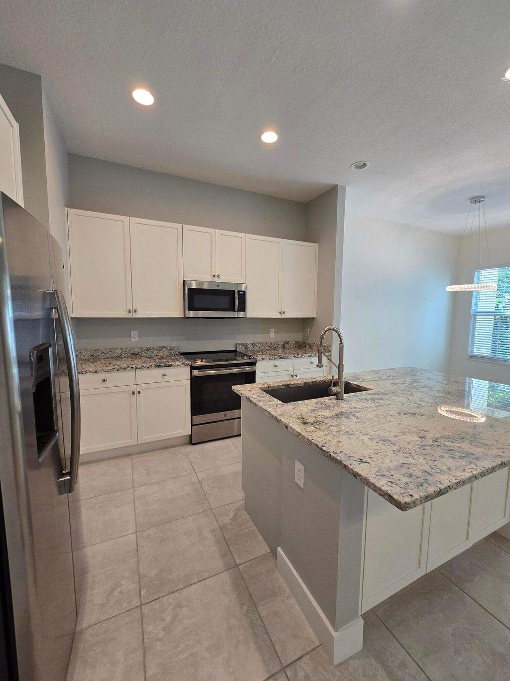 Photo of 4920 Pointe Midtown Way, Palm Beach Gardens, FL 33418 (MLS # B26022460)