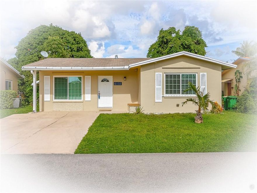 WATCH THE SLIDESHOW. All ages welcome! Affordable, Remodeled and just Beautiful.  This single-family home has a 2-car driveway and great curb appeal.  It is situated on a large private lot with canal access out back. The new 2022 upgraded kitchen features new cabinetry with soft close drawers, Quartz Carrara white countertops and SS appliances.  All the light fixtures and ceiling fans have been upgraded. The AC was replaced in 2021, the Whirlpool Washer & Dryer in 2018, the hot water heater in 2019, and the entire home features impact windows except for the back patio area. Both bathrooms were also updated in 2017. The low HOA fee includes sprinkler & lawn maintenance, a community pool, a covered picnic area and clubhouse! You can rent after 3 yearrs of ownersip. 2 pets up to 40 lbs each.