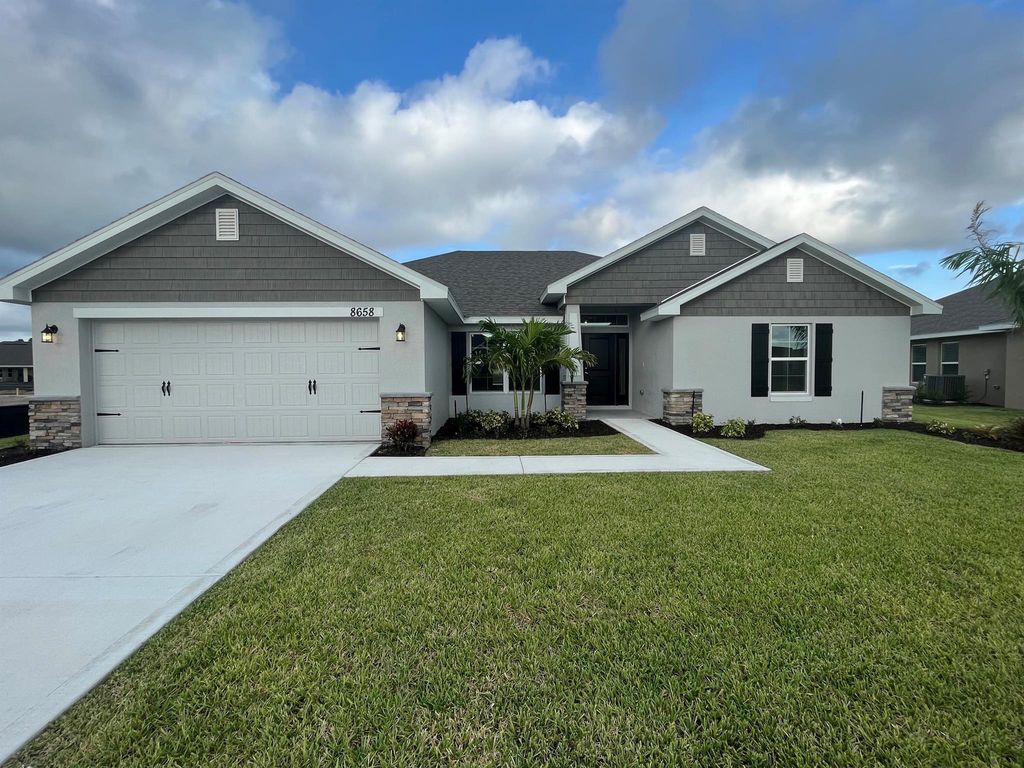 Photo of 8658 Waterstone Boulevard, Fort Pierce, FL 34951 (MLS # R10893502)