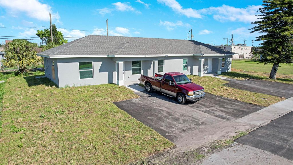 Photo of 548 SW 5th Street #A, Belle Glade, FL 33430 (MLS # R10976784)