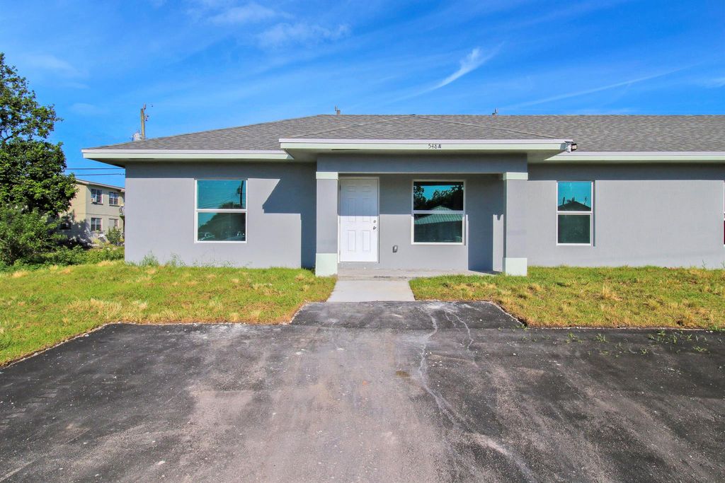 Photo of 548 SW 5th Street #A, Belle Glade, FL 33430 (MLS # R10976784)