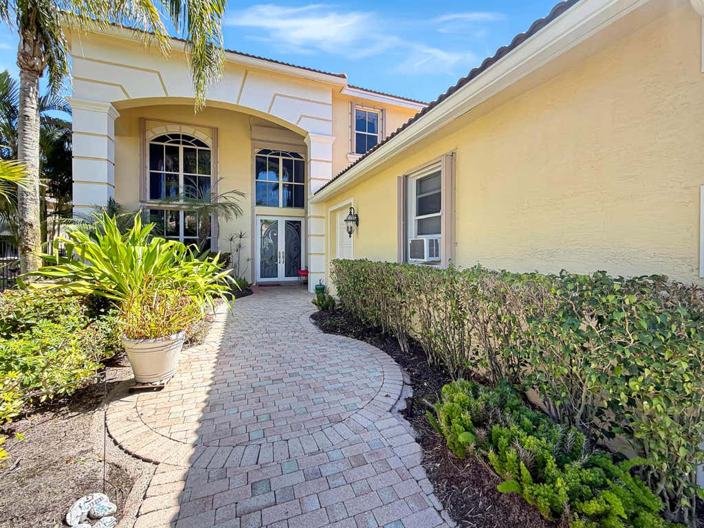 Photo of 10891 Northgreen Drive, Lake Worth, FL 33449 (MLS # B26060335)