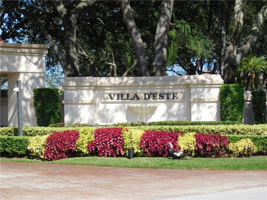EXCITING MEDITERRANEAN STYLE HOME ON A  CORNER LOT ON A CUL-DE-SAC WITH PRIVATE POOL in the exclusive gated community of Villa D'Este in Deer Creek, a non-equity golf course community.  This two story, 4 bedroom/3 bath has a working fireplace in the family room/kitchen, volume ceilings and views of the tropical back yard from almost every room.   An estate double door entry leads to the living room and family room.  Two bedrooms on the first floor, master up.  Fourth bedroom is configured for an office on the first floor. Just 3 miles to Deerfield Beach Island.  Close to all major roadways, shopping and dining.