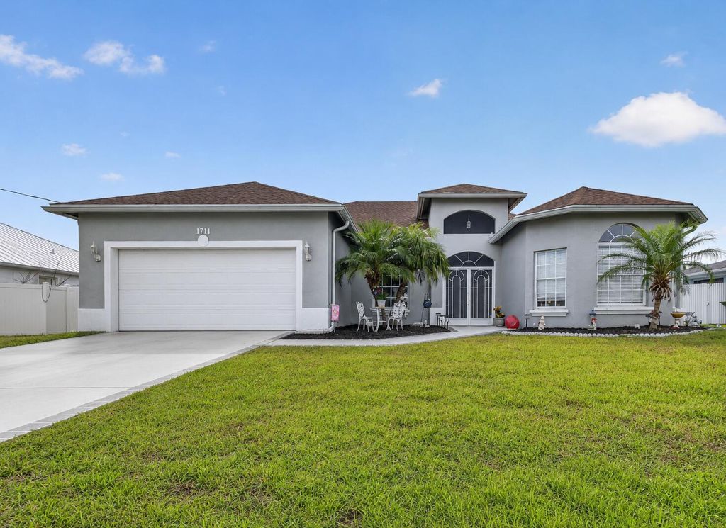 Photo of 1711 SE Fairfield Street, Port Saint Lucie, FL 34983 (MLS # B26030269)