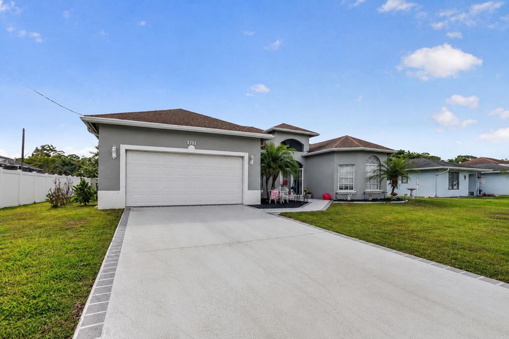 Photo of 1711 SE Fairfield Street, Port Saint Lucie, FL 34983 (MLS # B26030269)