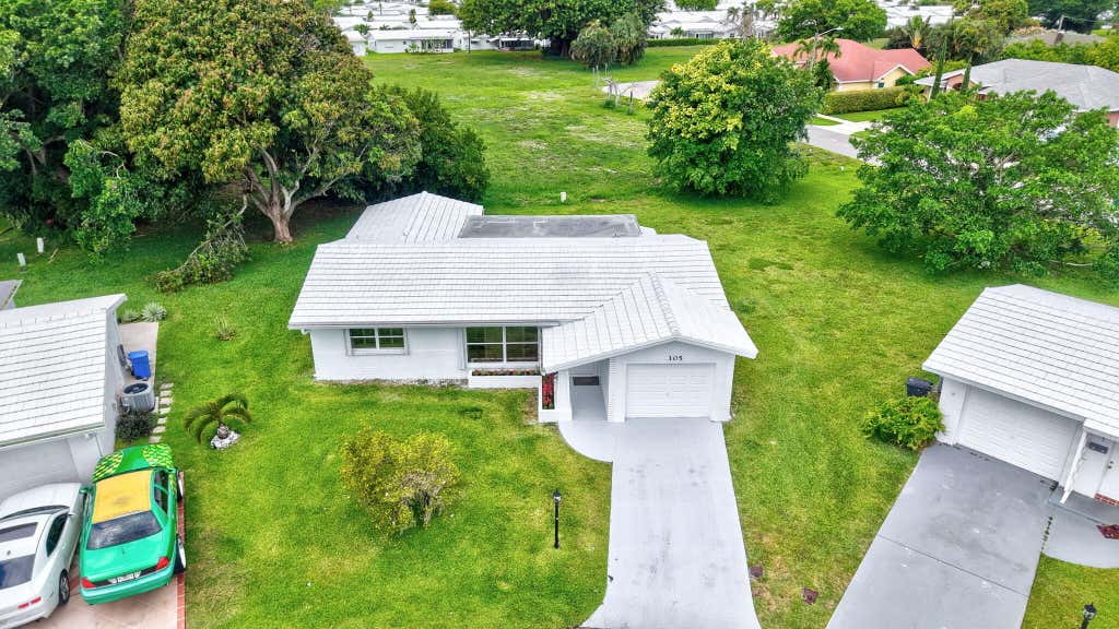 Photo of 105 NW 8TH Place, Boynton Beach, FL 33426 (MLS # B26063445)