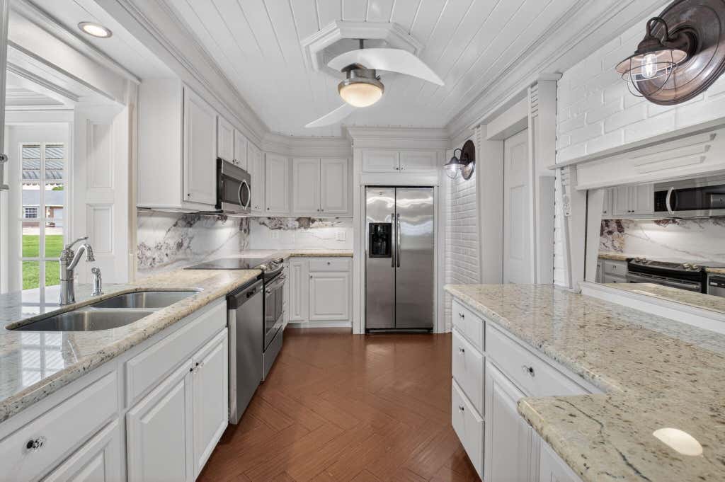 Photo of 105 NW 8TH Place, Boynton Beach, FL 33426 (MLS # B26063445)