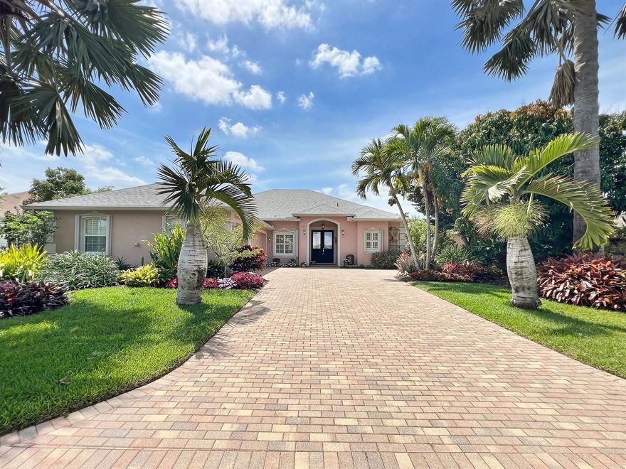 Welcome to a symphony of nature where hues of vibrant colors cast a warm sunset glow over the surrounding waterfront preserve scenery. This oasis was meticulously crafted with lush tropical landscaping to create a private hideaway for the refreshing saltwater pool & spa enclosed in an expansive screened in outdoor entertaining space overlooking the relaxing waters of the serene lake. Inside this exceptional residence, enjoy a thoughtfully laid out home complete with 4 generously sized bedrooms, 3 full bathrooms and 3-car garage. True to old Florida style, elegant Plantation style shutters, crown molding and calming colors accent the home and setting the coastal ambiance for the indoor living spaces. Being offered as fully furnished, you'll enjoy ample comfortable seating arrangements and dining spaces throughout. Paired with numerous upgrades to the home including modern lighting, maple kitchen cabinetry appointed with granite countertops, and brand new stainless steel appliances. Retreat to the primary bedroom, where you'll have your own separate wing of the home, dual walk-in closets and an en-suite bath with a Kohler walk-in tub, separate shower, and double vanity spaces. With your own private access to the lanai & pool area, you'll truly appreciate those summer evenings in paradise.

Establish peace of mind, with a newly installed roof in 2023, accordion storm shutters & roll down patio protection, along with a brand new water heater. The community of "The Pines" is a supplement of the premier master planned Pineapple Plantation, boasting seven different lakes totaling 23 acres, and 142 acres of designated wetlands and preserves. You will be located just steps to the Pineapple Park (home to 30 acres of various recreational facilities & outdoor events), 3.5 miles from the beautiful unspoiled beaches of Hutchinson Island, only minutes from numerous golf courses, World Class fresh and salt water fishing and the Treasure Coast Square Mall. Martin County is well known for it's highly rated schools and well maintained parks. We invite you to enjoy this harmonious blend of nature and luxury found at this incredibly stunning home.