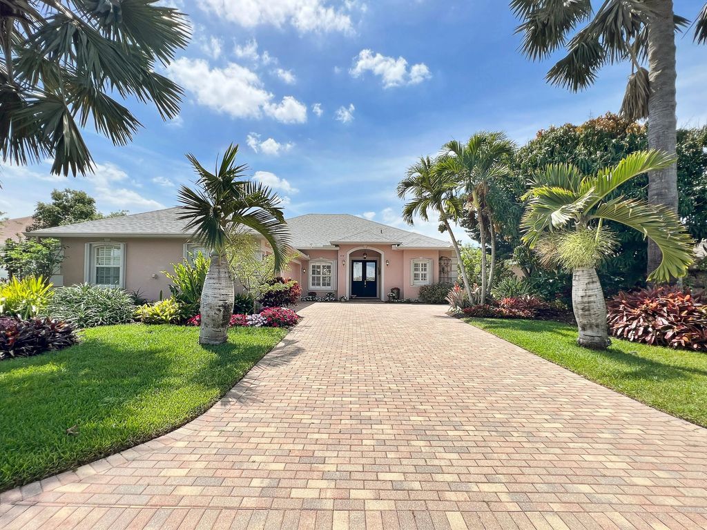 Photo of 454 NW Sunflower Place, Jensen Beach, FL 34957 (MLS # R10974740)