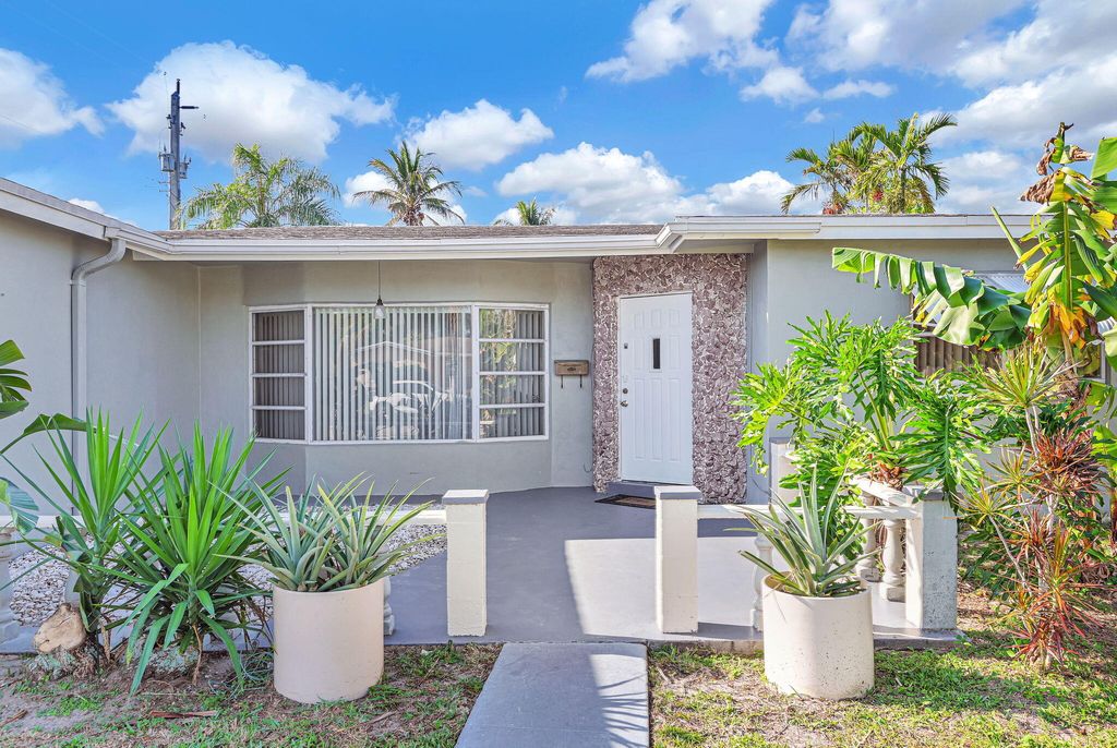 Photo of 5060 NW 41st Court, Lauderdale Lakes, FL 33319 (MLS # B26007336)