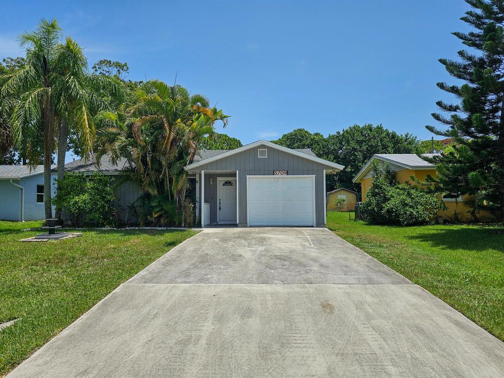 Photo of 5709 SE Normandy Avenue, Stuart, FL 34997 (MLS # R11006116)