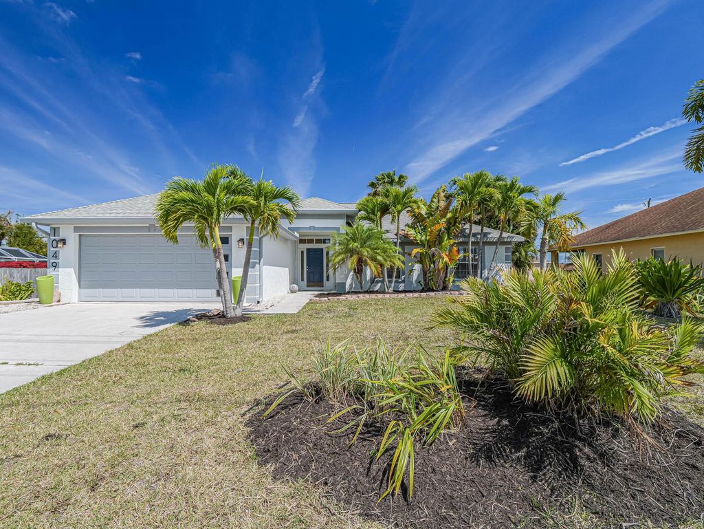 Photo of 1049 SW Alcantarra Boulevard, Port Saint Lucie, FL 34953 (MLS # R10974376)