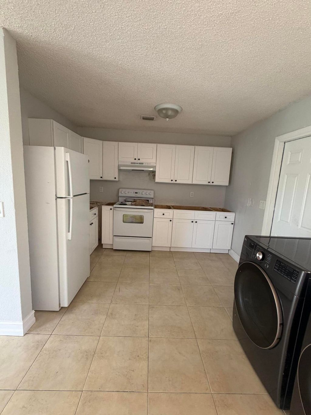 Photo of 1643 NE 3rd Avenue, Delray Beach, FL 33444 (MLS # B26042604)