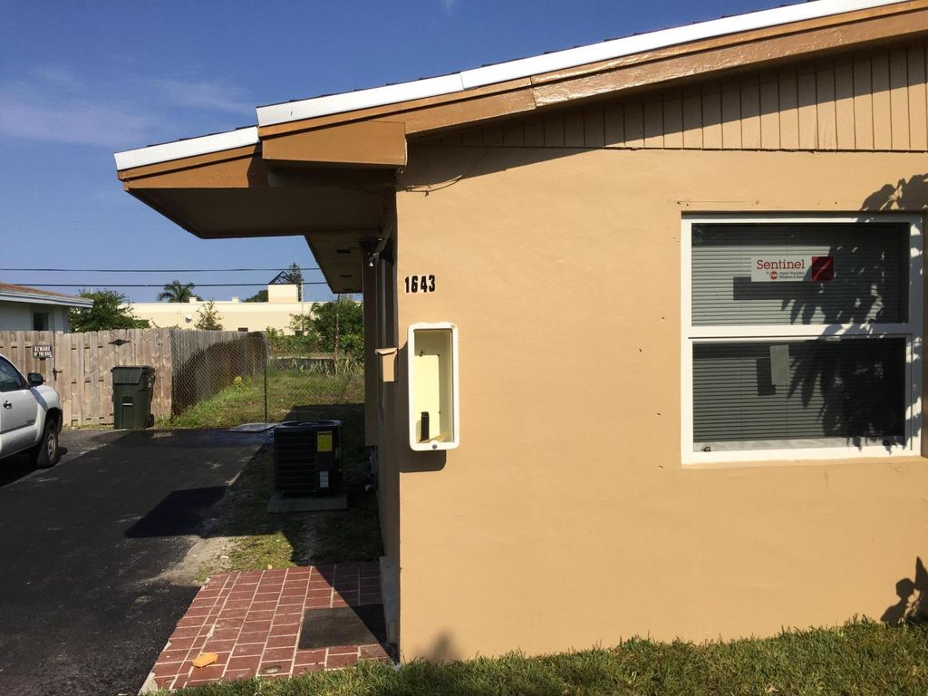 Photo of 1643 NE 3rd Avenue, Delray Beach, FL 33444 (MLS # B26042604)