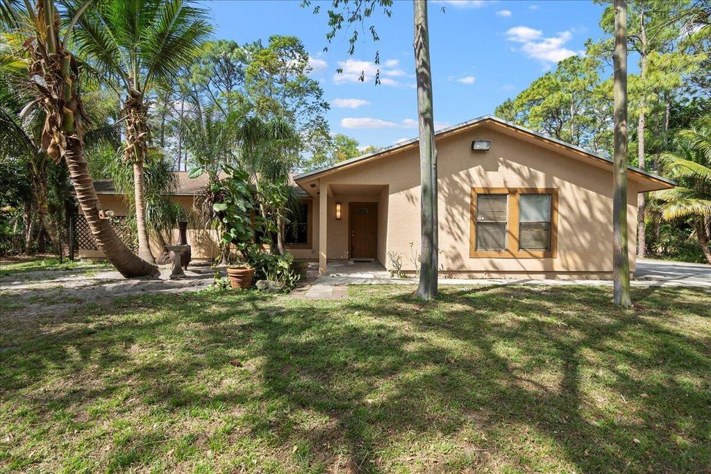 Photo of 4871 Coconut Boulevard, The Acreage, FL 33411 (MLS # R11067989)