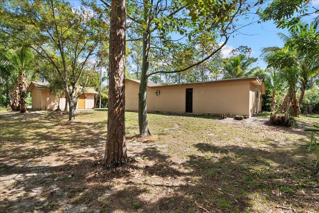 Photo of 4871 Coconut Boulevard, The Acreage, FL 33411 (MLS # R11067989)