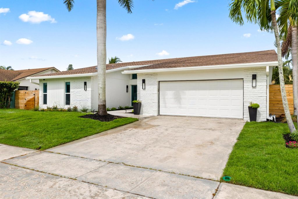 Photo of 3307 NW 28th Terrace, Boca Raton, FL 33434 (MLS # R11114958)