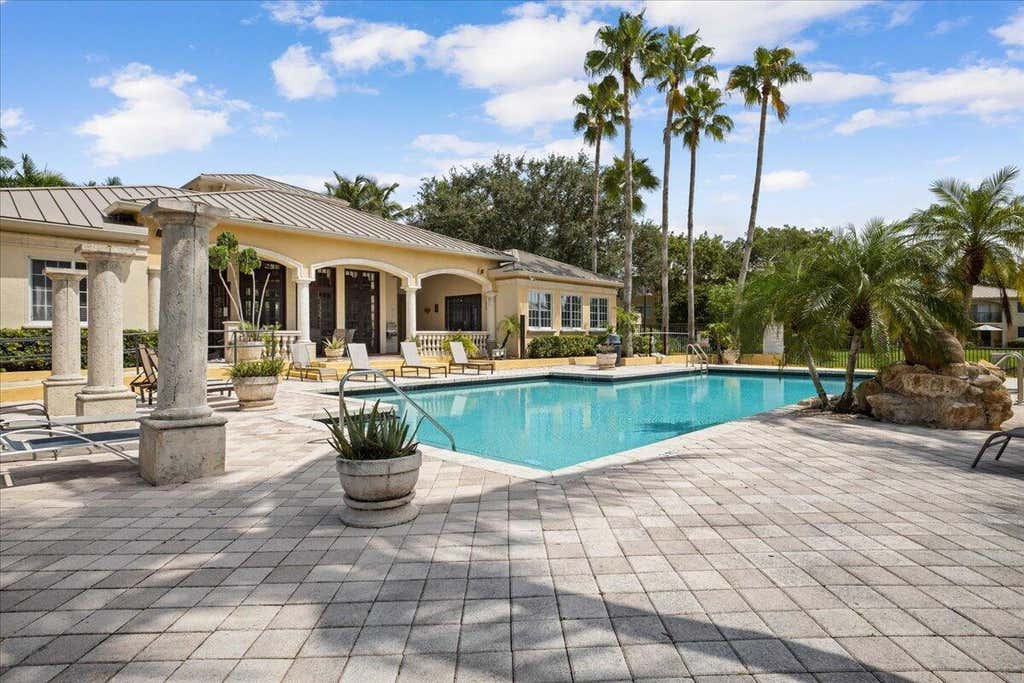 Photo of 200 N Crestwood Court N #211, Royal Palm Beach, FL 33411 (MLS # B26046261)
