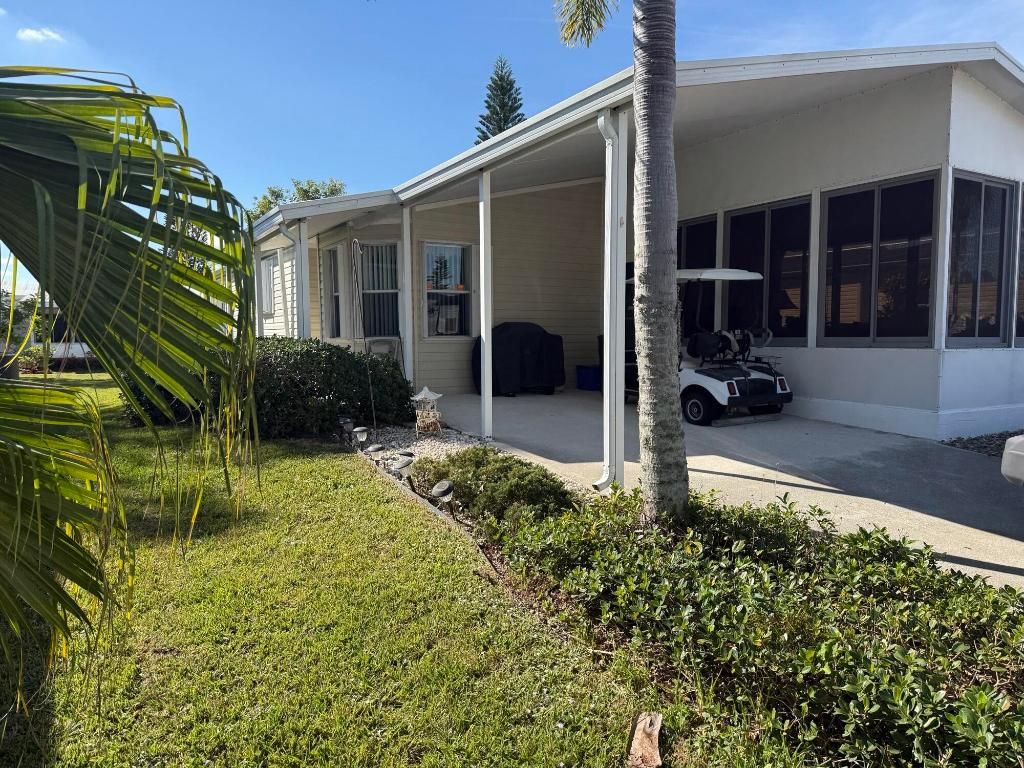 Photo of 6615 Spanish Lakes Boulevard, Fort Pierce, FL 34951 (MLS # R11145473)