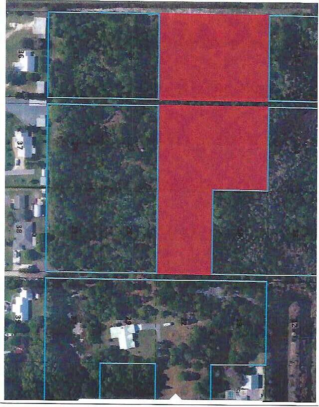 4.854 Acres total. Great for Landing Banking or a 1031 Tax Exchange! Total of 5 parcels.1924 Plat with 20' & 30' paper roads.