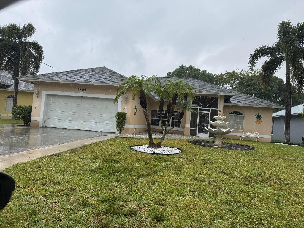 Photo of 1209 Dayman Avenue, Fort Pierce, FL 34950 (MLS # R11073955)